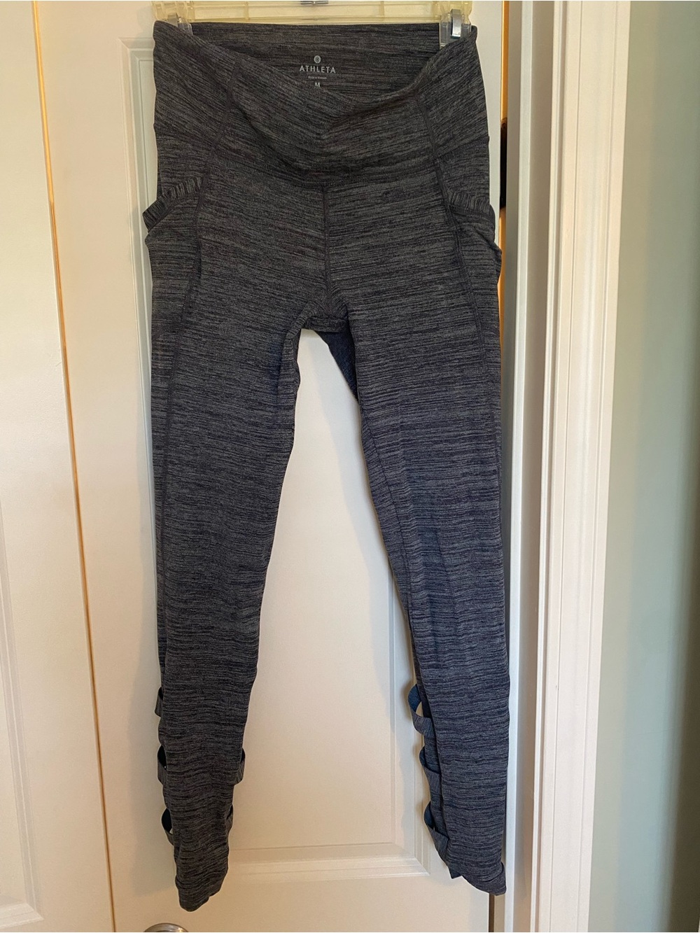 Athleta Women’s Gray Leggings with cross cross detail on calf -size medium